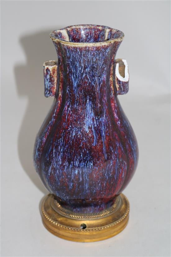 A Chinese flambe-glazed arrow vase, 18th/19th century, total height 21.7cm, faults